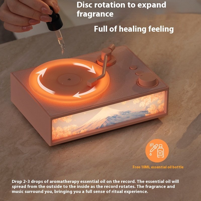 dad0c116-d301-43f6-a0c0-940c92f2fed9_trans.jpeg Desktop Fragrance Vinyl Bluetooth Speaker - Image 2